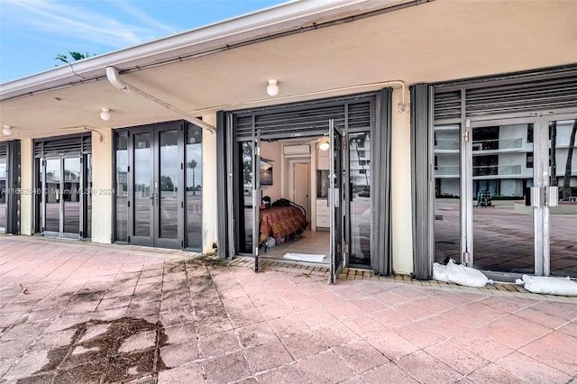 property entrance with a patio