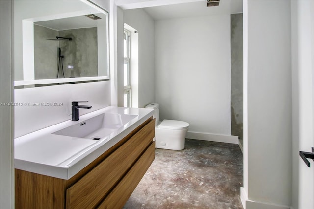 bathroom with a shower, concrete flooring, vanity, and toilet