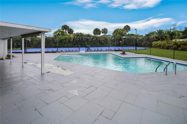 view of pool with a patio area