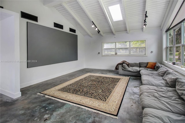 living room with wood ceiling, beam ceiling, and track lighting