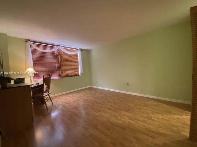 office area with hardwood / wood-style floors