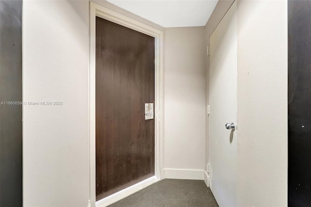 corridor featuring carpet