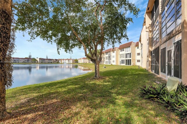 view of yard with a water view