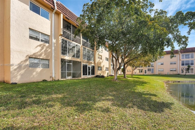 exterior space with a water view