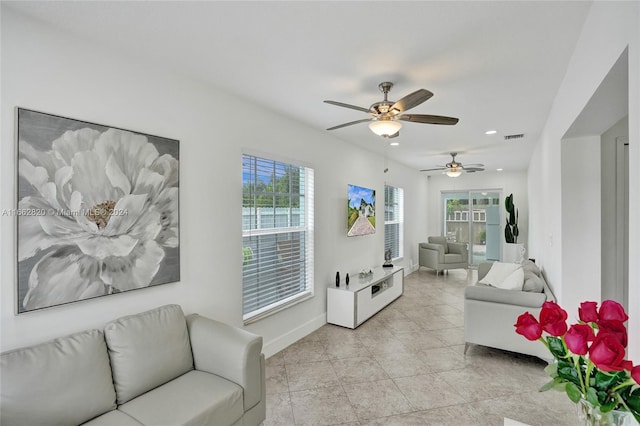 living room featuring ceiling fan