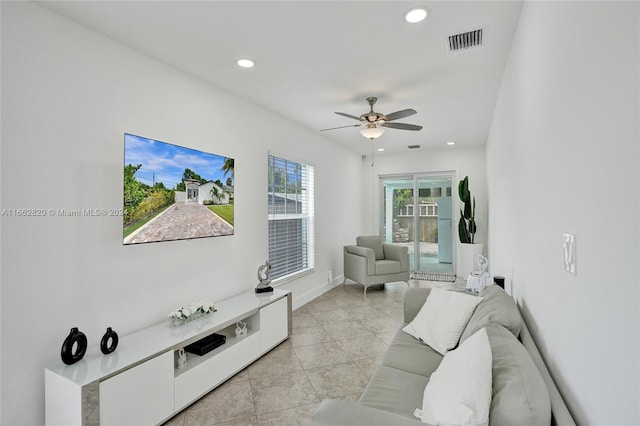 living room featuring ceiling fan