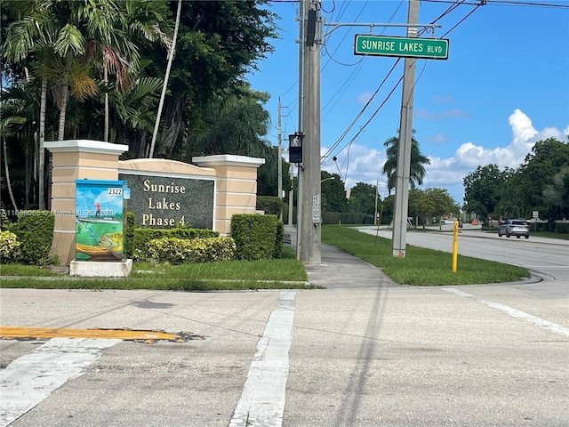 view of community sign