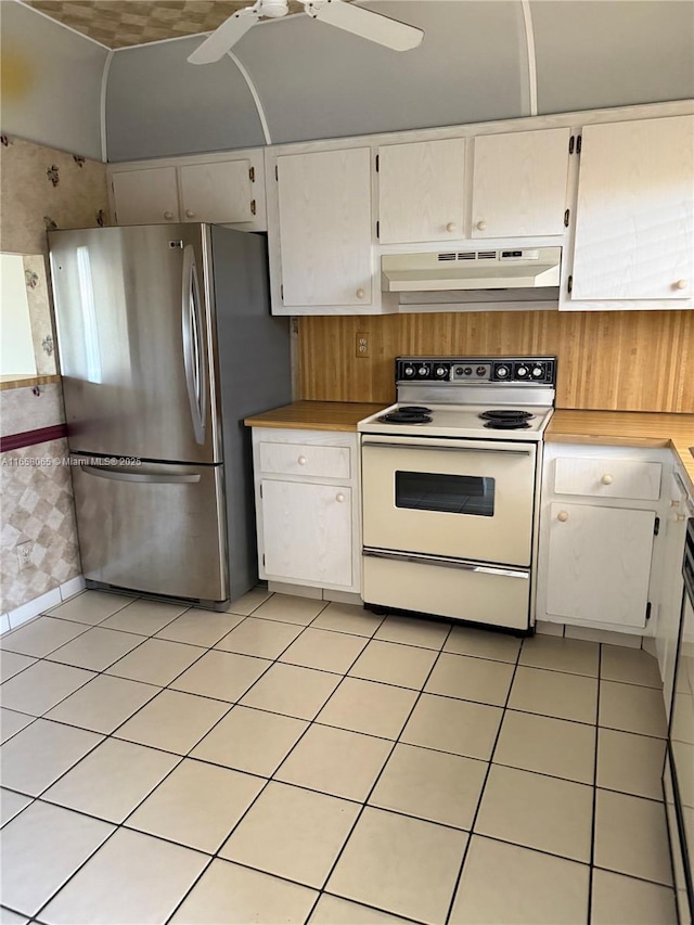 10442 Sunrise Lakes Blvd Unit 303, Sunrise, FL 33322 - kitchen featuring white cabinets, freestanding refrigerator, under cabinet range hood, white electric stove, and a ceiling fan