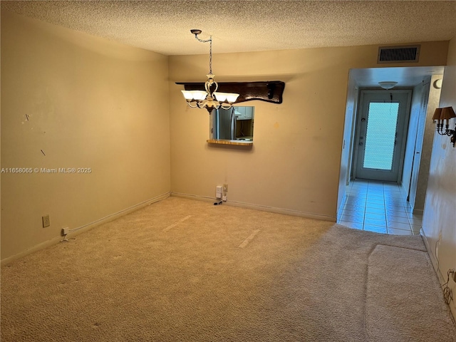 10442 Sunrise Lakes Blvd Unit 303, Sunrise, FL 33322 - empty room with an inviting chandelier, visible vents, carpet, baseboards, and a textured ceiling