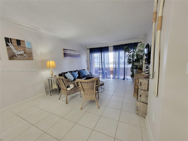 1980 S Ocean Dr Unit 2C, Hallandale Beach, FL 33009 - living room with crown molding, a textured ceiling, and light tile patterned floors