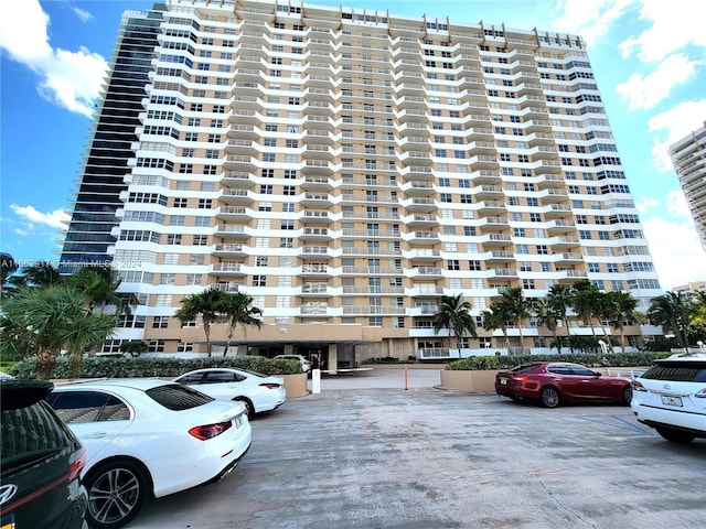 1980 S Ocean Dr Unit 2C, Hallandale Beach, FL 33009 - view of apartment building / complex with uncovered parking