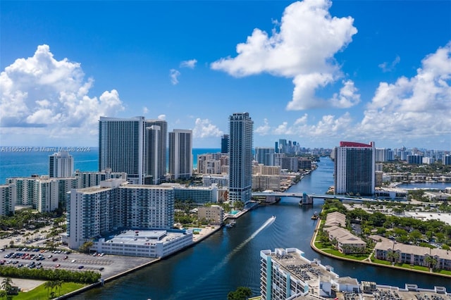 property's view of city featuring a water view