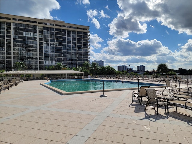 view of pool featuring a patio