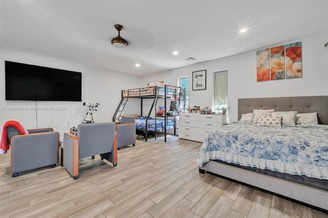 bedroom featuring ceiling fan and light wood-type flooring