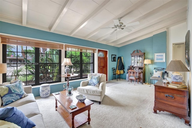 carpeted living room featuring ceiling fan and vaulted ceiling with beams