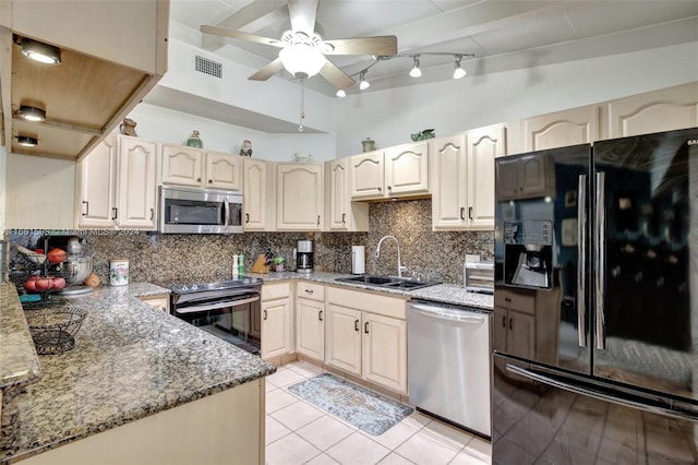 kitchen with ceiling fan, light tile patterned floors, sink, backsplash, and appliances with stainless steel finishes