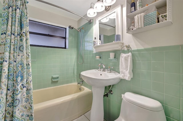 bathroom featuring tile walls, shower / tub combo, toilet, and tile patterned flooring