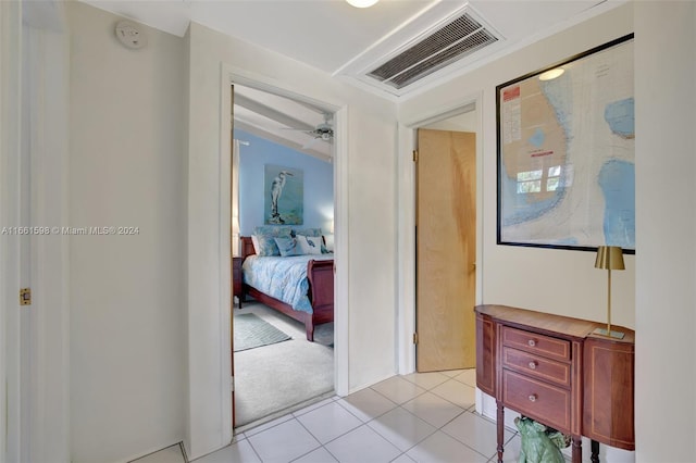 hallway with light tile patterned floors