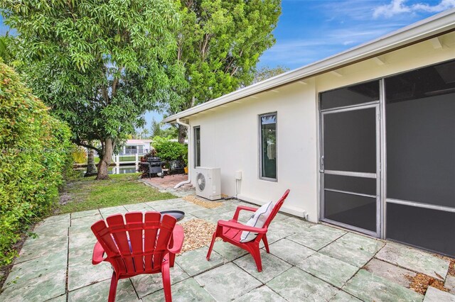 view of patio with ac unit