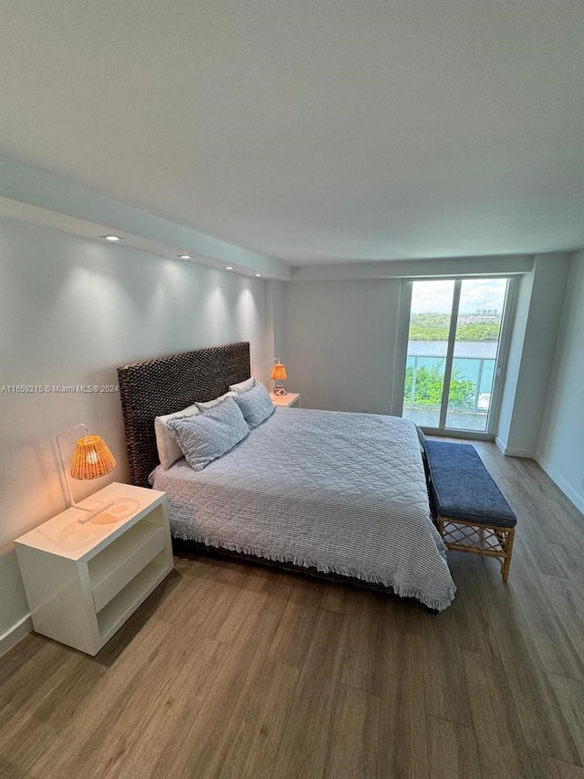 bedroom featuring hardwood / wood-style floors