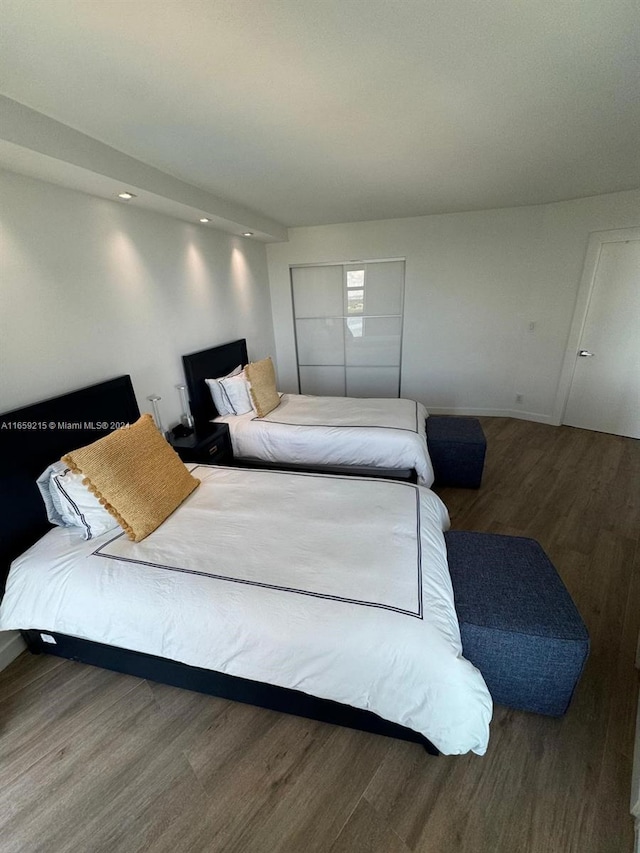 bedroom with wood-type flooring