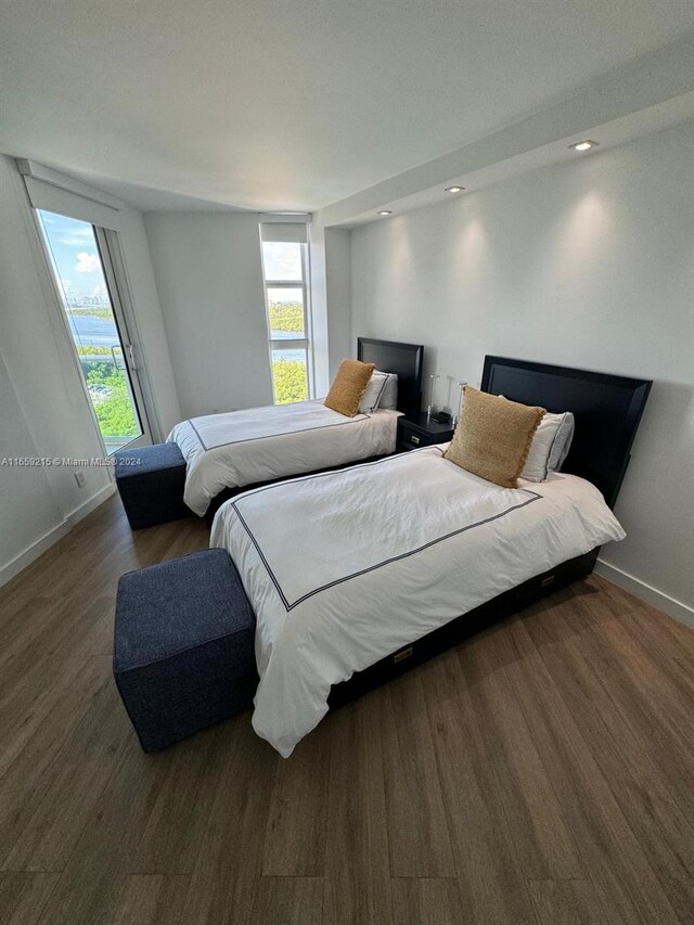 bedroom featuring dark hardwood / wood-style floors