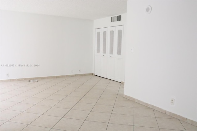 16919 N Bay Rd Unit 118, Sunny Isles Beach, FL 33160 - unfurnished room featuring light tile patterned floors and baseboards