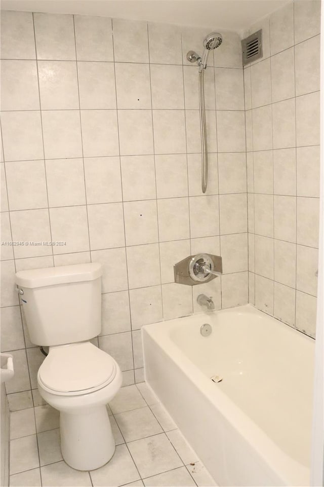 16919 N Bay Rd Unit 118, Sunny Isles Beach, FL 33160 - full bathroom with tile patterned floors and shower / washtub combination