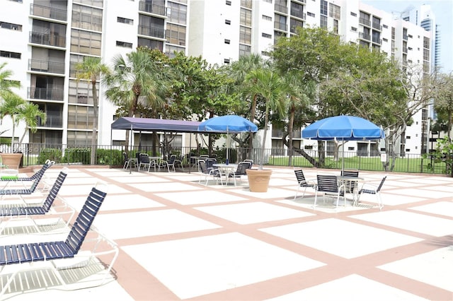 view of property's community featuring a patio area