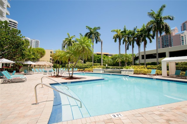 view of swimming pool featuring a patio