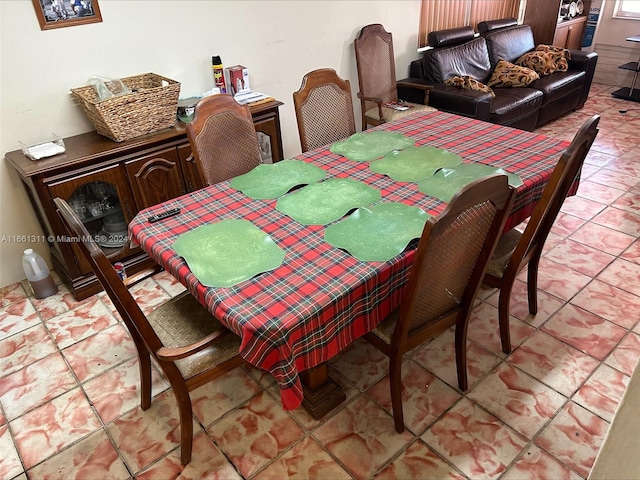 view of tiled dining space