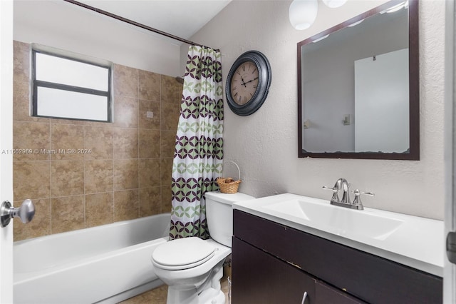 full bathroom featuring shower / tub combo, vanity, and toilet