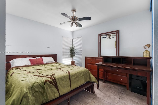 bedroom featuring light tile patterned floors and ceiling fan