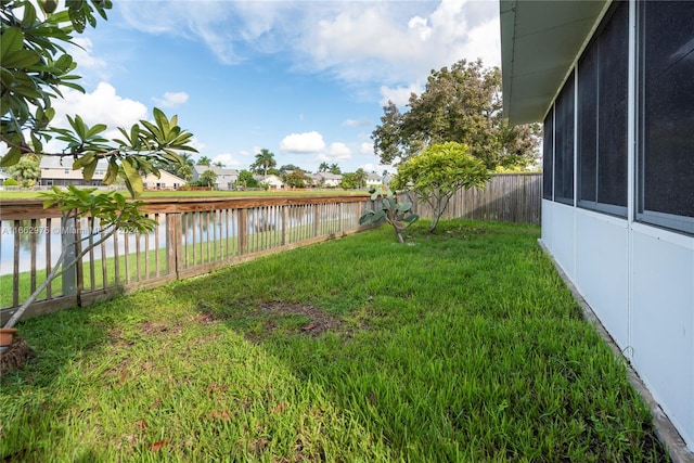 view of yard with a water view