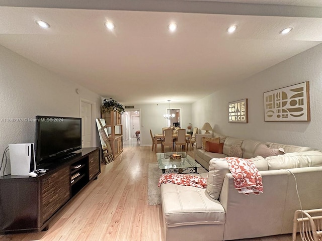 living room with light hardwood / wood-style floors