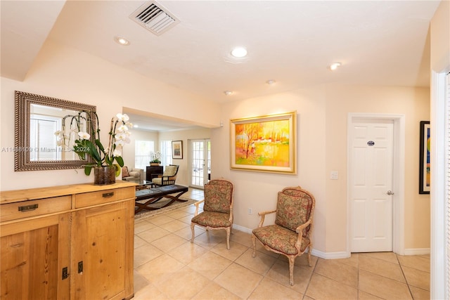 living area with light tile patterned flooring