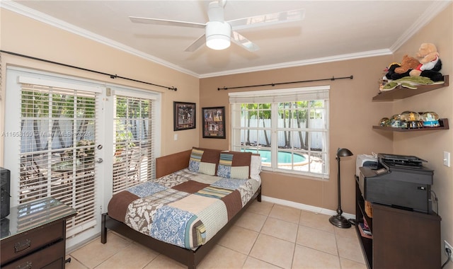 tiled bedroom featuring multiple windows, access to outside, ceiling fan, and crown molding