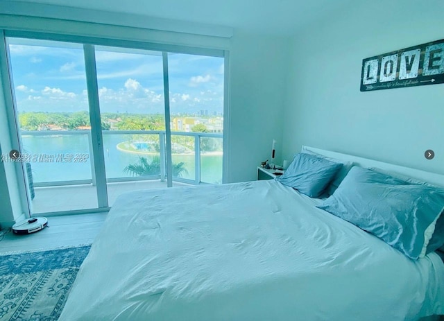 bedroom with wood finished floors