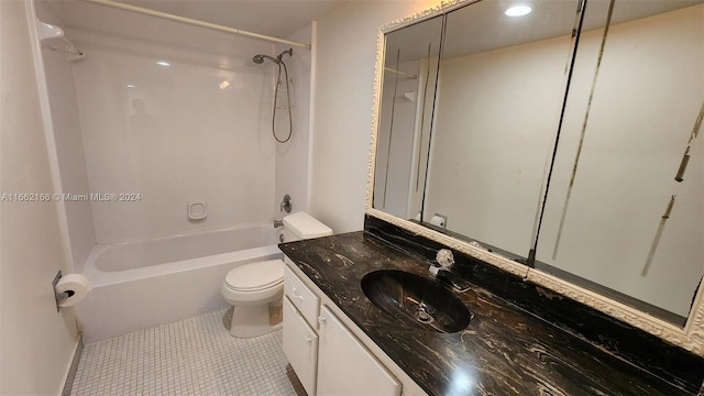 full bathroom featuring  shower combination, vanity, tile patterned flooring, and toilet