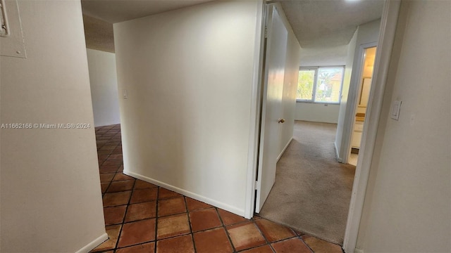 hall featuring tile patterned floors