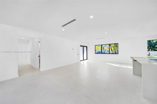 interior space featuring light tile patterned floors