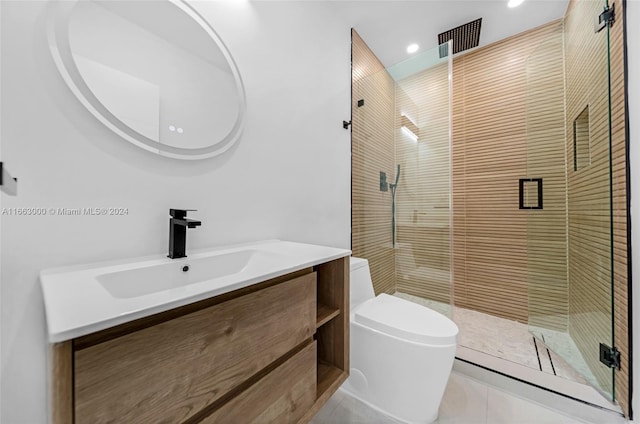 bathroom featuring vanity, toilet, tile patterned floors, and an enclosed shower