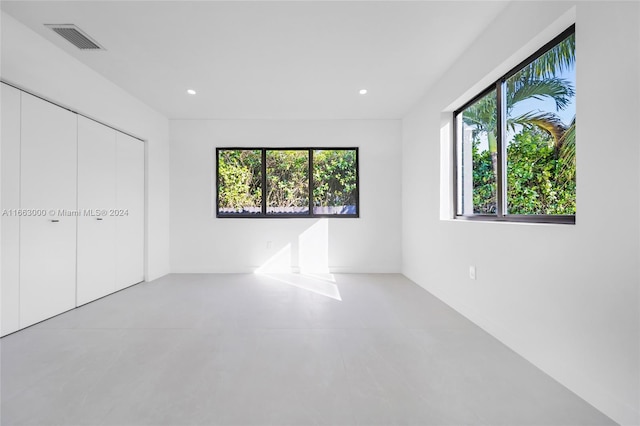 unfurnished bedroom featuring a closet