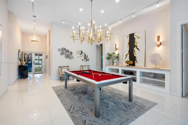 2112 NE 17th Ave, Wilton Manors, FL 33305 - playroom featuring baseboards, a chandelier, billiards, and tile patterned flooring