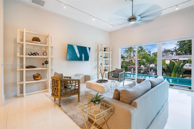 2112 NE 17th Ave, Wilton Manors, FL 33305 - tiled living area featuring track lighting, ceiling fan, and visible vents