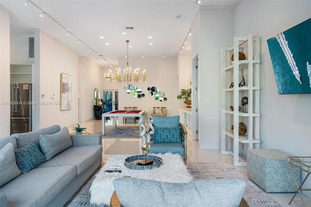 2112 NE 17th Ave, Wilton Manors, FL 33305 - living area featuring recessed lighting, rail lighting, a chandelier, and visible vents