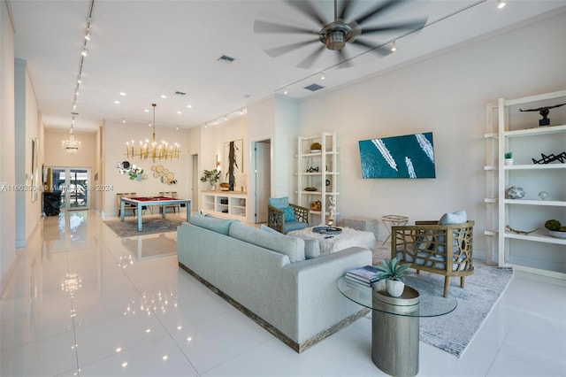 2112 NE 17th Ave, Wilton Manors, FL 33305 - tiled living area with a ceiling fan, visible vents, track lighting, and french doors