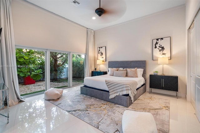 2112 NE 17th Ave, Wilton Manors, FL 33305 - bedroom with visible vents, a high ceiling, tile patterned floors, and access to exterior