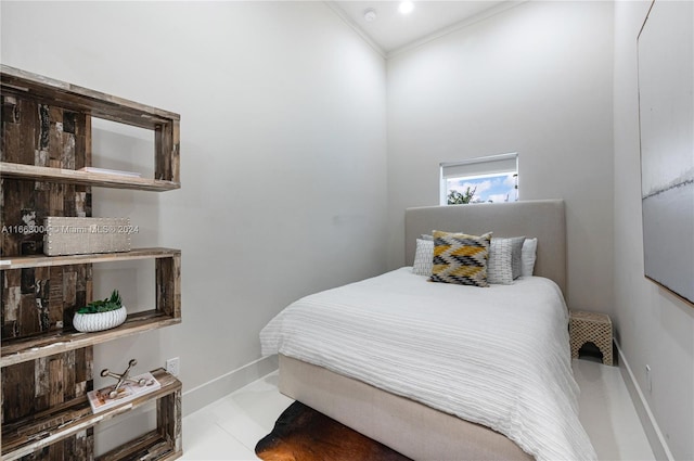 2112 NE 17th Ave, Wilton Manors, FL 33305 - bedroom featuring crown molding and baseboards