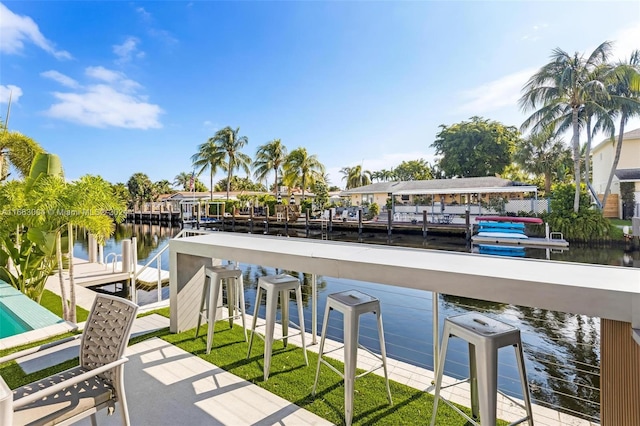2112 NE 17th Ave, Wilton Manors, FL 33305 - view of patio / terrace featuring a water view